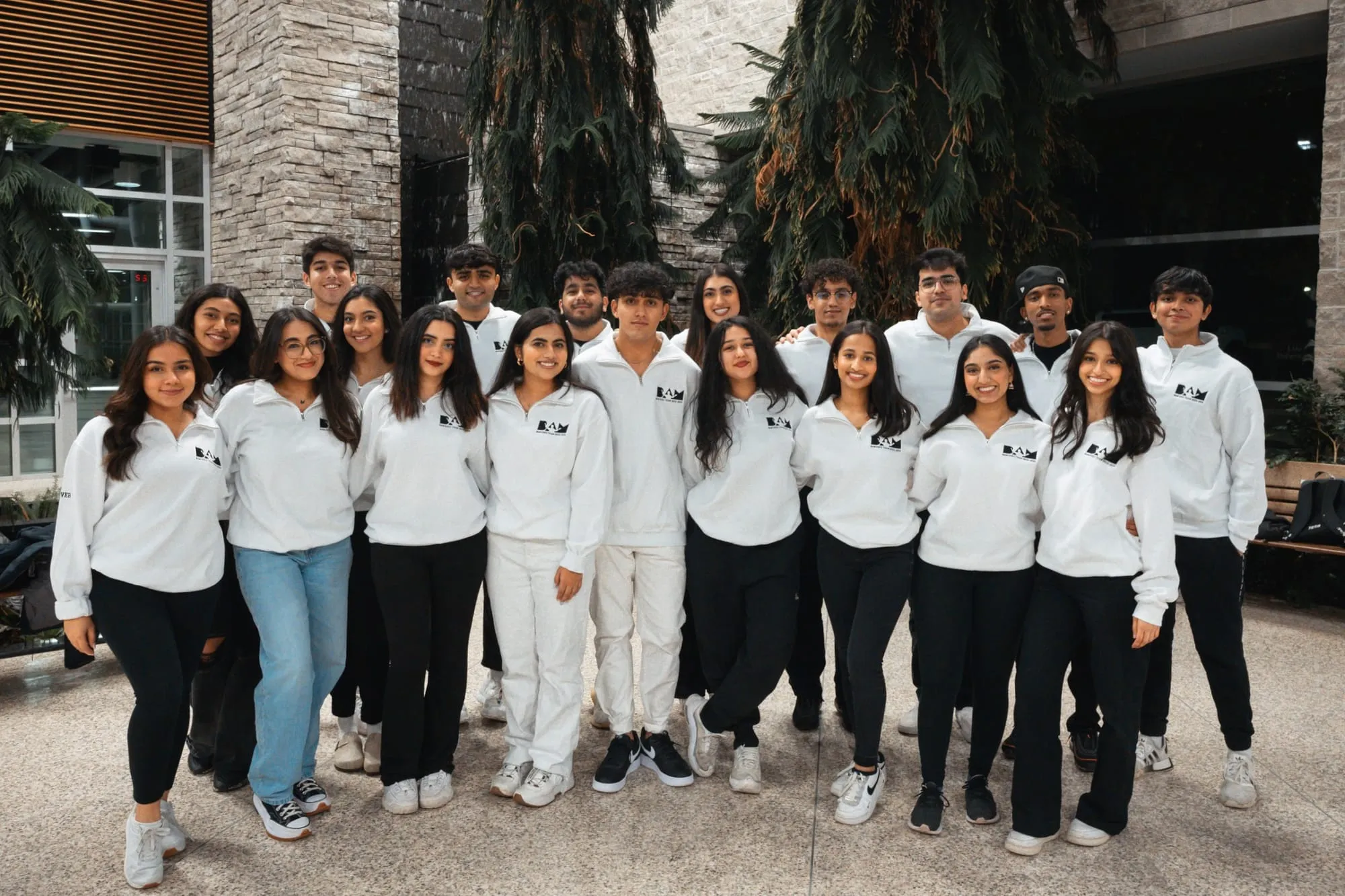 Dev with members of the student group he founded at McMaster University